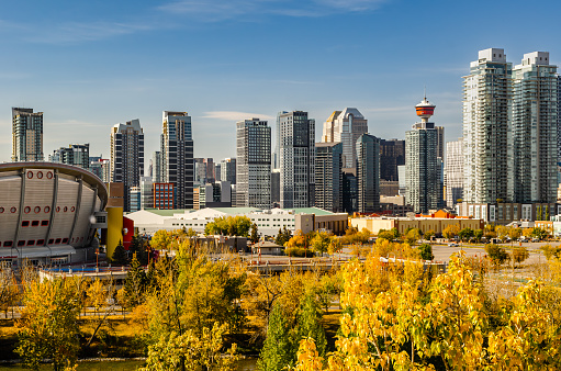 Calgary, Alberta, Canada – October 9, 2022: Calgary's downtown east side, autumn view with Saddledome and Calgary Tower