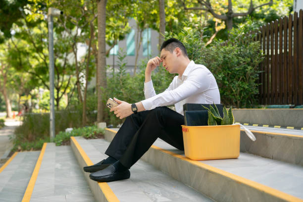 istock Singapore retrenchment dejected 2018963076
