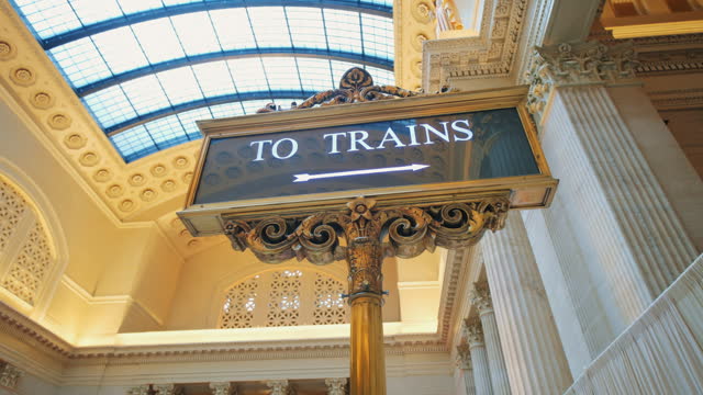 To Trains sign in interior of the waiting hall of Union Station, Chicago, Illinois