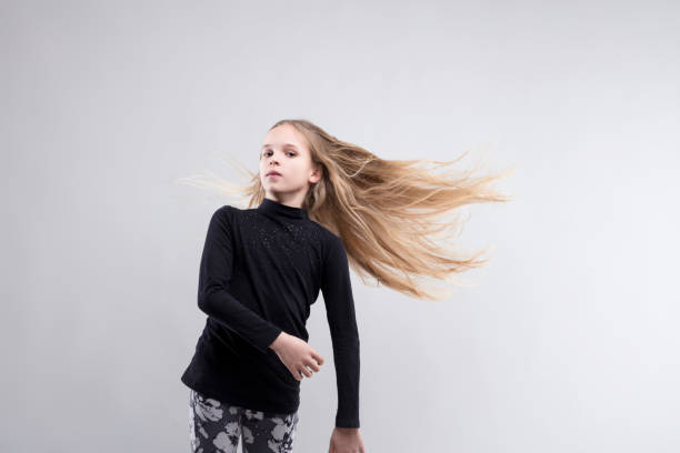istock Dynamic hair motion exudes girl's confident style 2018995318
