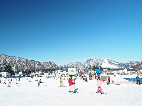 Pictures of people skiing and scenery at a ski resort in Echigo-Yuzawa, Japan.