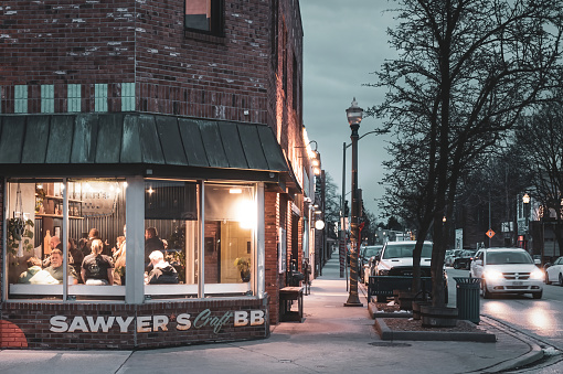 Windsor, Ontario, Canada - February 16, 2024:  One of the up and coming neighbourhoods in Windsor is the Ford City district.   Sawyer's Craft BBQ is one of the popular restaurants in the area.