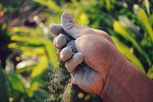 istock carry cement dust in hand 2019116960