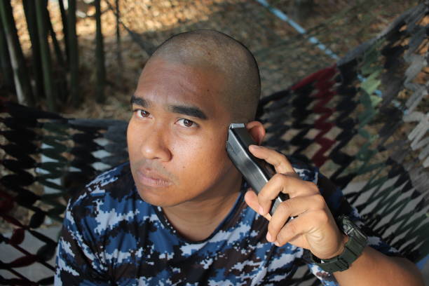 sick man cut his own hair