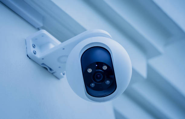 istock Modern CCTV camera on a wall of a residential building 2019303838