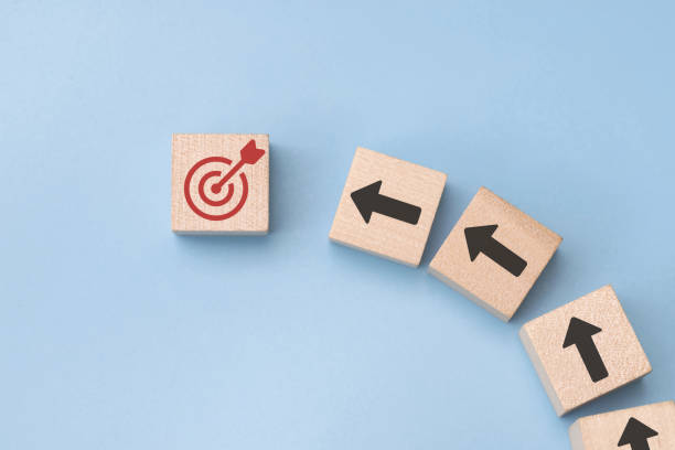 istock wood cube block with growth according to business goals 2019369932