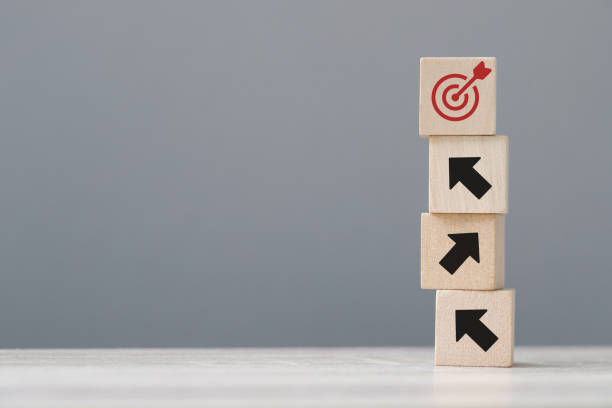 istock wood cube block with growth according to business goals 2019375612