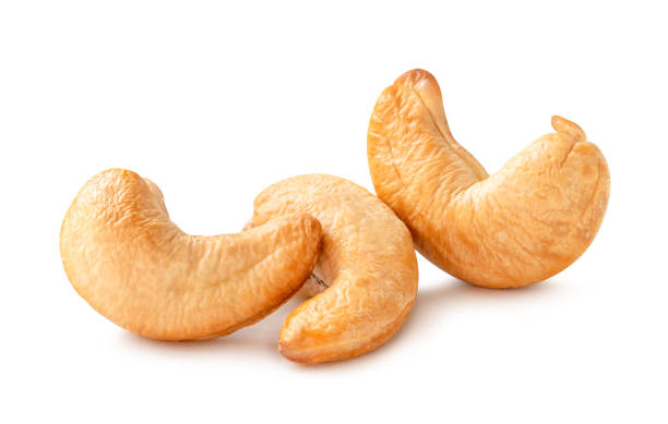 istock Front view of three Roasted brown cashew nuts in stack isolated on white background with clipping path 2019401673