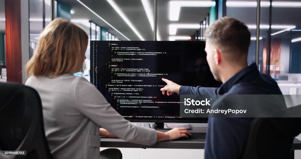 Computer Programmer Using Development Software Stock Photo - Download ...