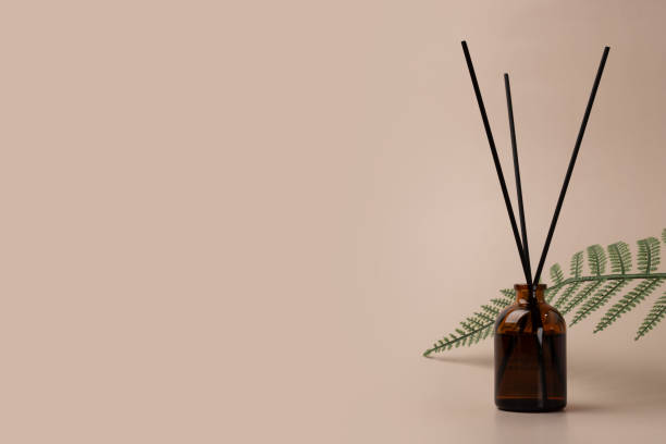 istock Aromatherapy, diffuser on natural backdrop, air filled with scent, cozy ambiance 2019485287