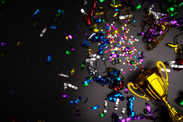 istock Victory cup, confetti celebration, triumphant moment, prize achievement 2019486387