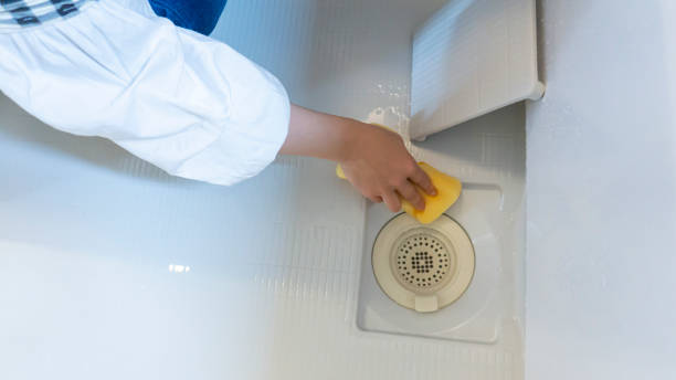 istock Cleaning the drains in the bathroom 2019546259
