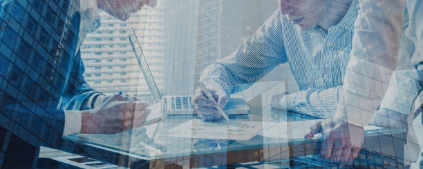 istock business people team banner background with double exposure, hands 2019579898