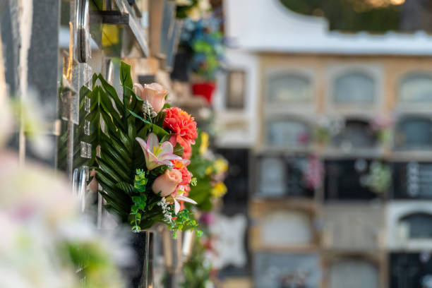 istock flowers on the gravestone in the cemetery 2019593298