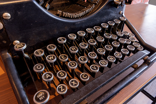 Old Typewriter. Vintage Typewriter Machine Closeup Photo.