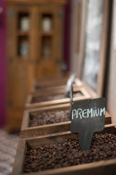 Coffee beans showing various stages of roasting from raw, stock photo