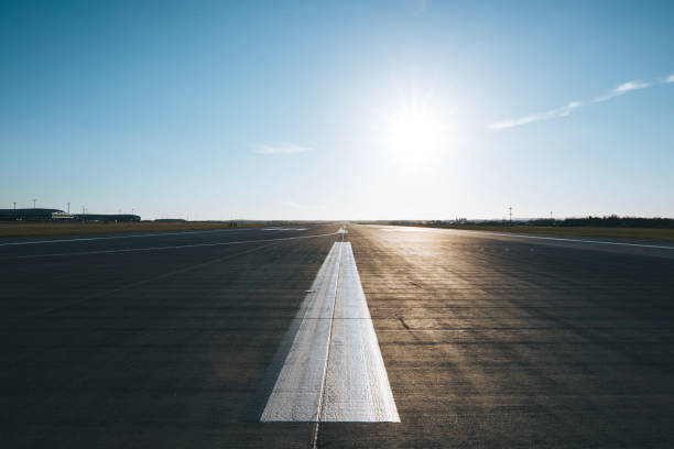 istock Surface level of long airport runway 2019662987