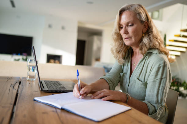 istock Woman Watching Webinar On Laptop 2019690178