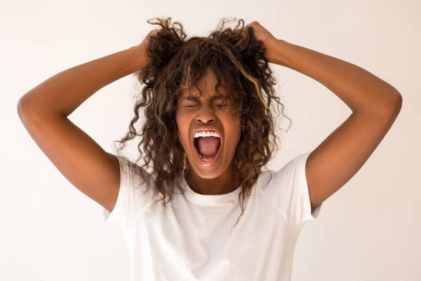 istock Woman with hands in hair 2019724092