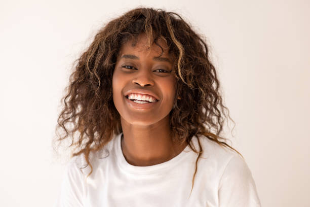 istock Attractive young woman posing alone against a gray background in the studio 2019725680