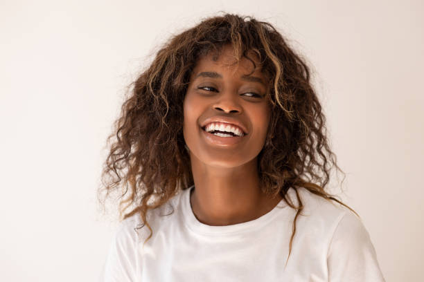 istock Attractive young woman posing alone against a gray background in the studio 2019726714