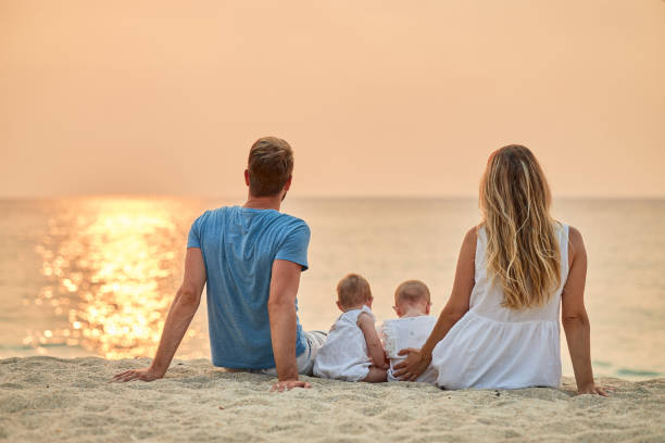 istock A family enjoying a tropical paradise beach during sunset 2019749530