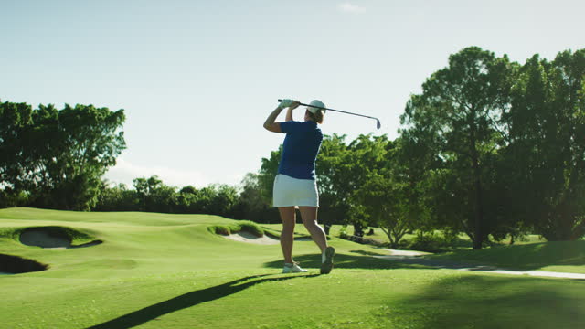 Female Golf Player Tee Off in golf