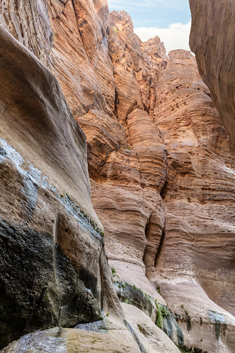 The unearthly  beauty of the high mountains on the both sides of the dry stream in the gorge Wadi Al Ghuwayr or An Nakhil and the wadi Al Dathneh near Amman in Jordan