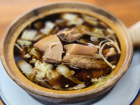 Buk Kut Teh, a Chinese pork soup dish, eat with rice and some vegetable, normally found in Southeast Asia.