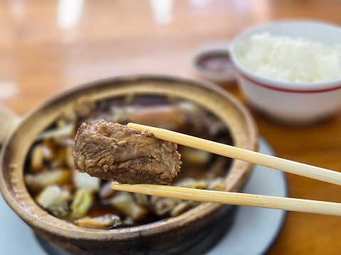 Buk Kut Teh, a Chinese pork soup dish, eat with rice and some vegetable, normally found in Southeast Asia.