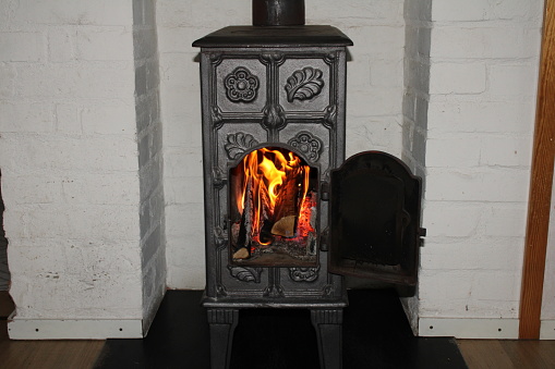 A nice fire in an old iron stove