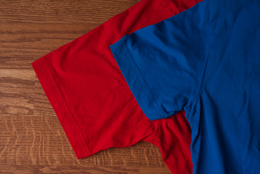 Red t-shirt and blue t-shirt.