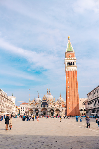 Venice (Italian: Venezia) is a city in northeastern Italy and the capital of the Veneto region. It is built on a group of 118 small islands that are separated by expanses of open water and by canals; portions of the city are linked by over 400 bridges. The islands are in the shallow Venetian Lagoon, an enclosed bay lying between the mouths of the Po and the Piave rivers (more exactly between the Brenta and the Sile).\n\nPiazza San Marco, often known in English as St Mark's Square, is the principal public square of Venice, Italy, where it is generally known just as la Piazza (\