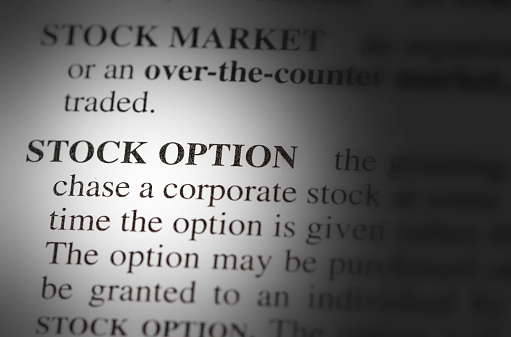 close up photo of the words stock options