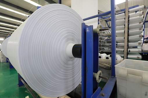 Production of white and transparent polypropylene flat yarn for the production of industrial bags. Bag making circular loom machine. Production of polypropylene sleeves. Buenos Aires - Argentina