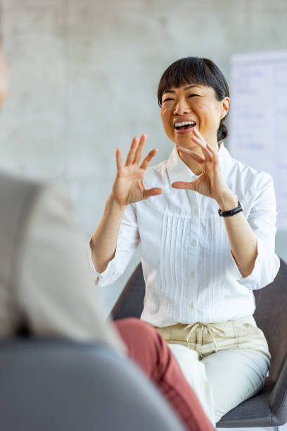istock Therapist speaking to a client about a solution to depression or anxiety at a clinic 2019981430