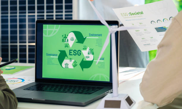 istock ESG ( environment, social,governance) recycle sign on laptop screen with carbon free chart board in office 2019990287
