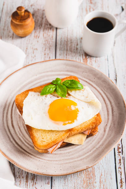 istock French croque madame hot breakfast sandwich on a plate on the table vertical view 2020039179