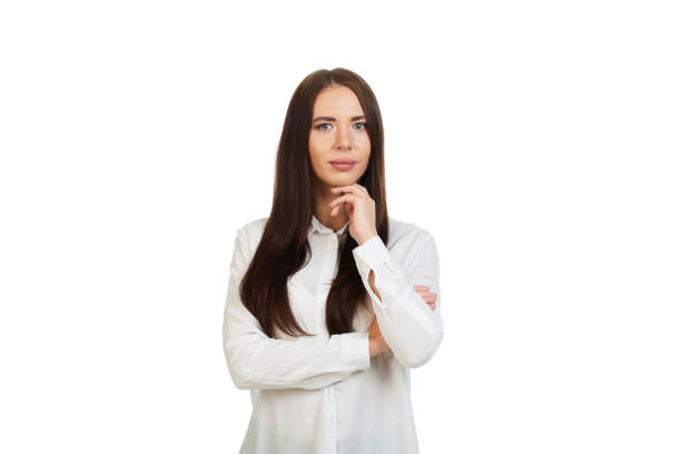 istock Young, beautiful girl in a white shirt on a white background. 2020103870