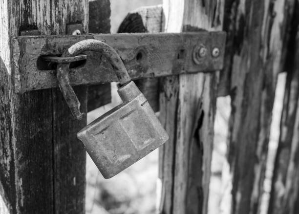 istock old rusty padlock on the door black and white photography 2020142350