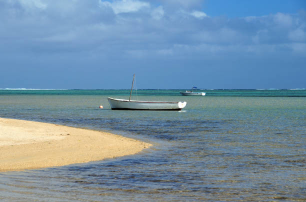 istock Le Morne beach - small boat and horizon over the reef, Mauritus 2020159277