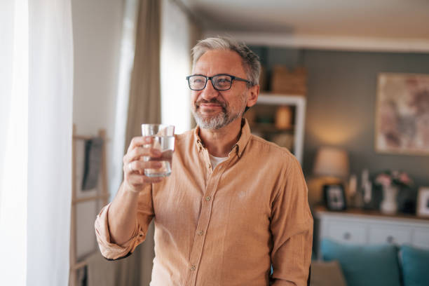 istock Mature man at social gathering 2020162621