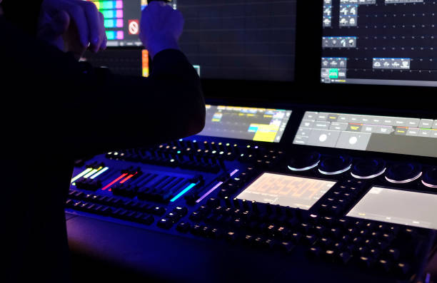 istock Backstage area at a convention center with technical staff handling light and sound 2020168577