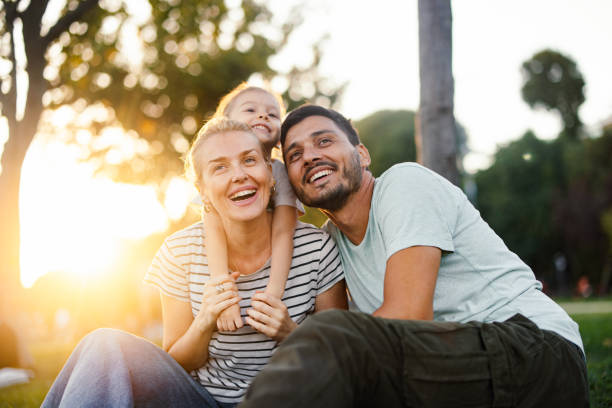 istock Smiling Family Having Fun Together Outdoors 2020183809