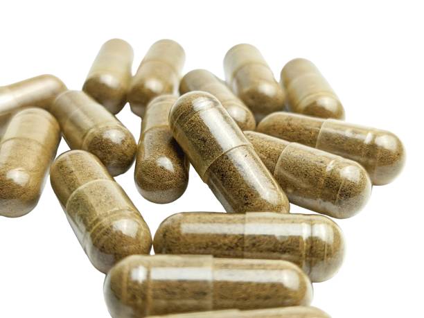 istock Herbal capsule medicine isolated on a white background 2020216893