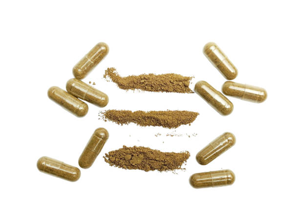 istock Powdered herbal capsule medicine isolated on white background 2020219067