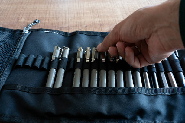 istock Choosing a pencil from a pencil bag. 2020237023