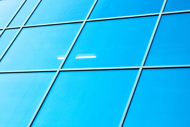 glazed facade. glazed facade against a blue background. modern skyscrapers of downtown