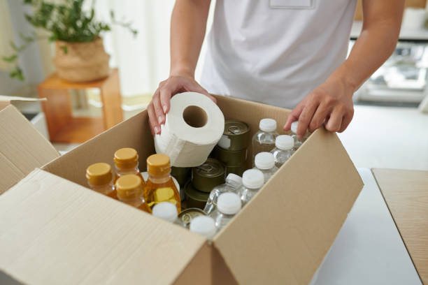 istock Volunteer Packing Food and Necessities 2020310983