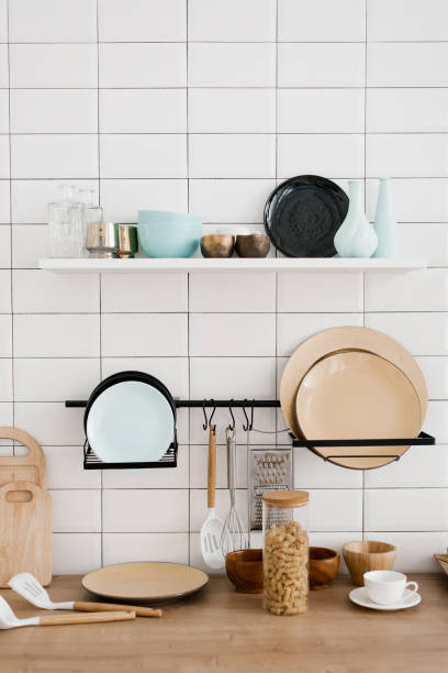 istock Kitchen utensils and utensils in the bright white wooden kitchen 2020314694
